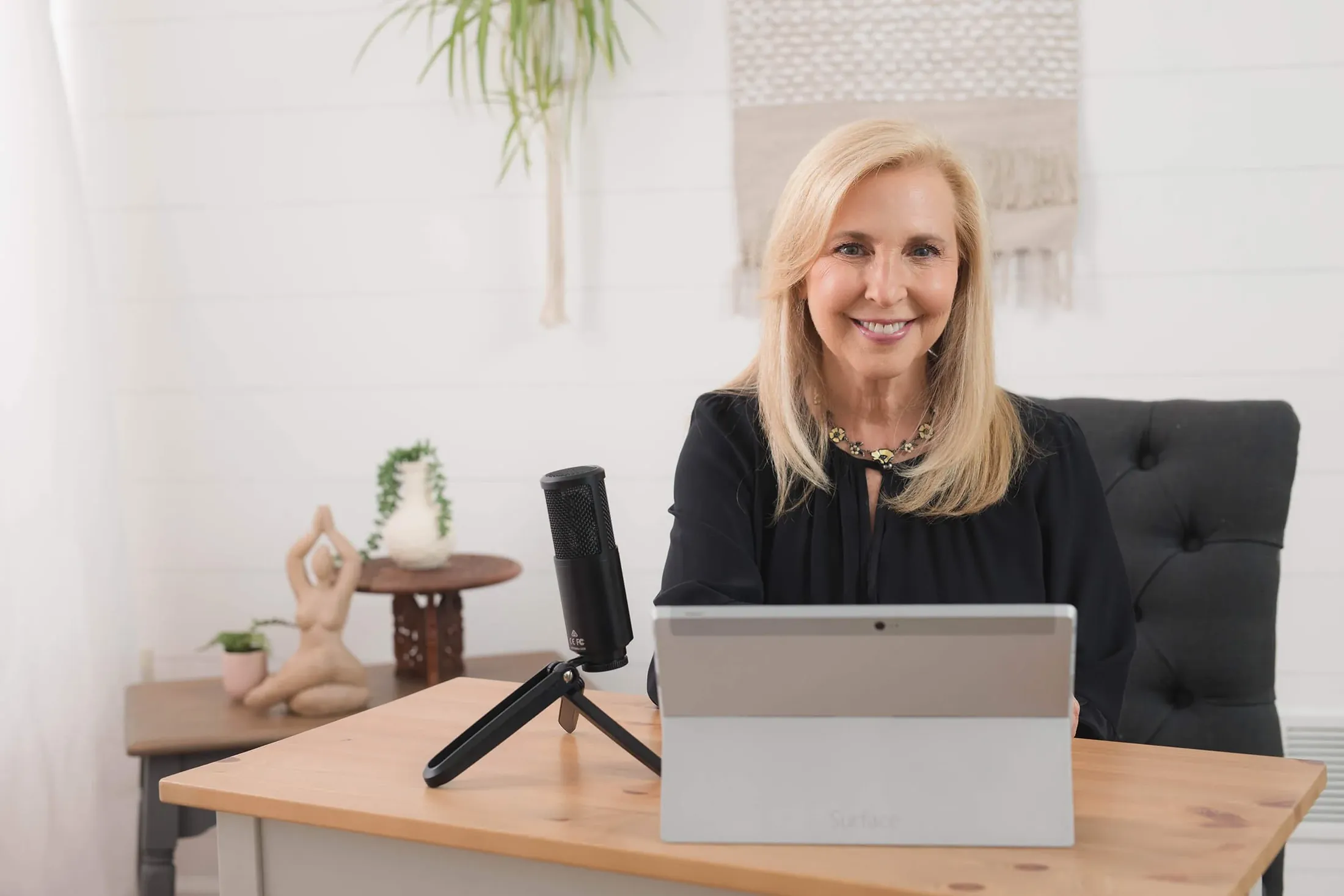 Lauren at her desk, ready for a video coaching session